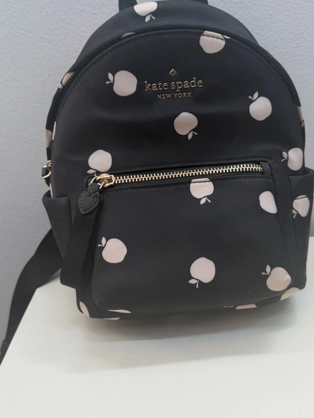 kate spade Black Mini Backpack with Pale Pink Apple Motif